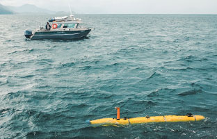 University of Victoria’s AUV surfaces on the waters of Juan Perez Sound. Photo courtesy of the University of Victoria.