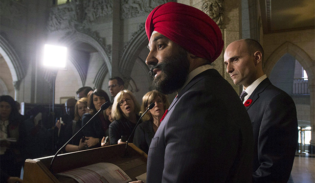 Navdeep Bains and Jean-Yves Duclos (to his right) announce plans to reinstate the mandatory long-form census Nov. 5 on Parliament Hill. Photo: The Canadian Press/Adrian Wyld.