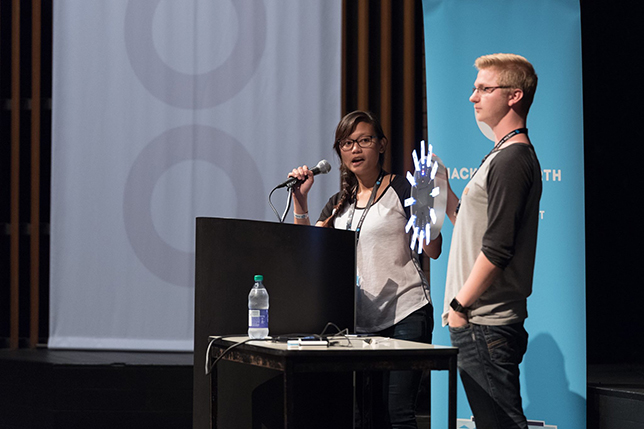Michelle Mabuyo and Brad Moon from the University of Alberta present their Weasley Clock. Photo by JK Liu.