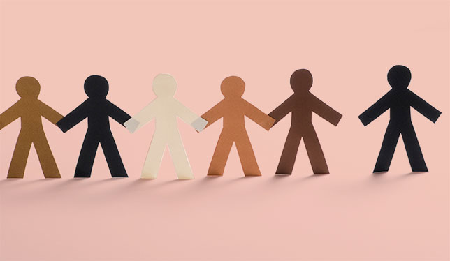 Paper cut outs of people in a variety of colours.